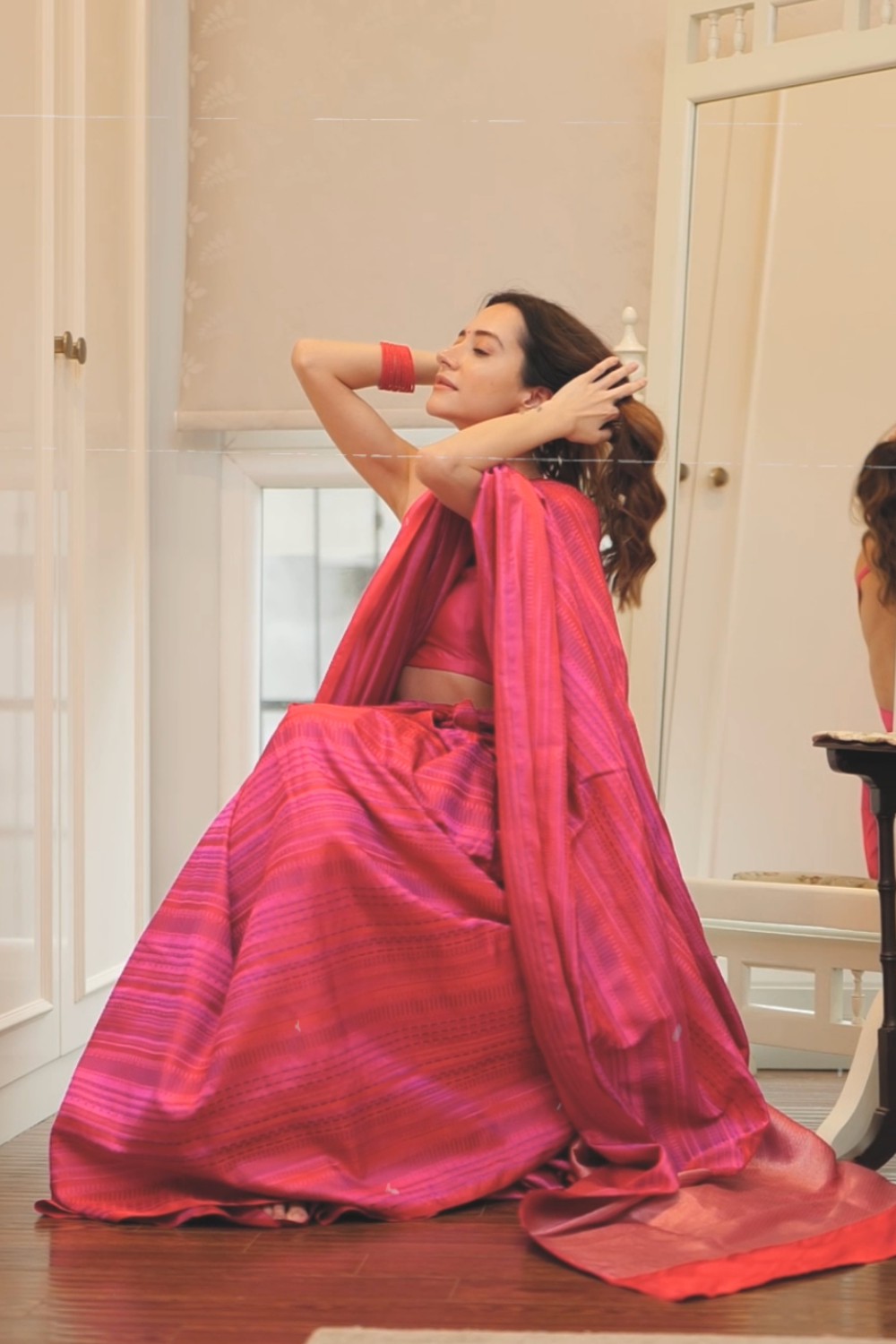 Komal Kapoor Grover in our handwoven pink tanchoi silk saree