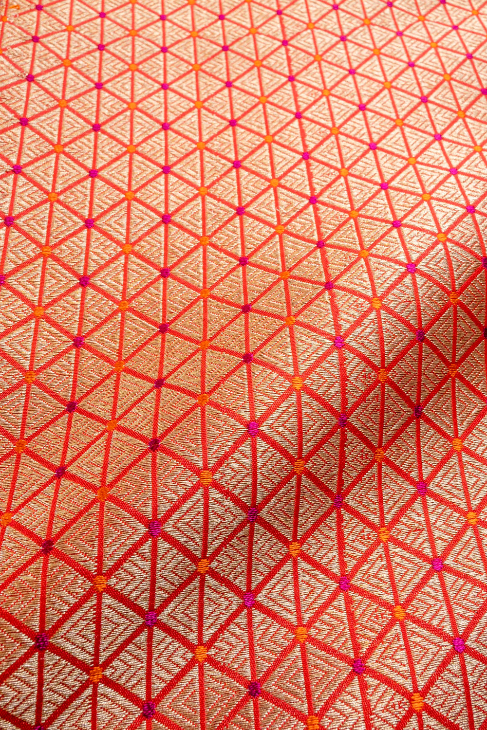 Handwoven red silk brocade fabric