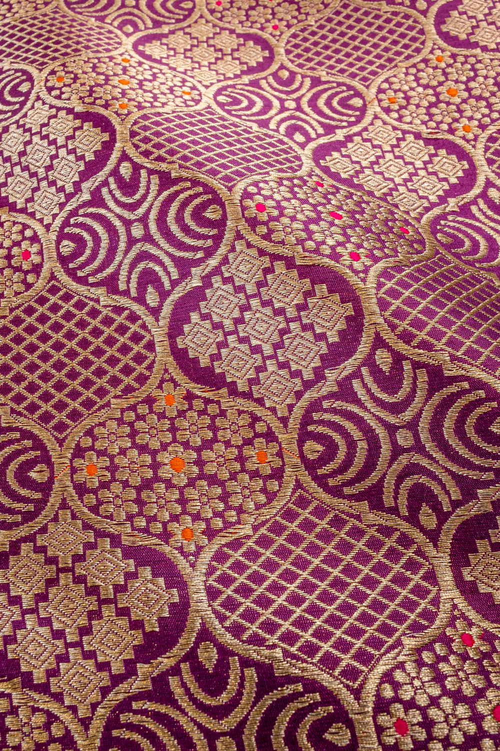 Handwoven purple silk brocade fabric