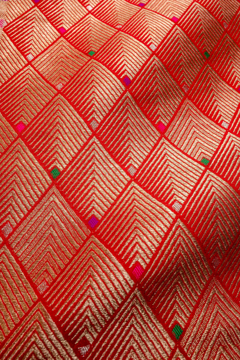 Handwoven red silk brocade fabric