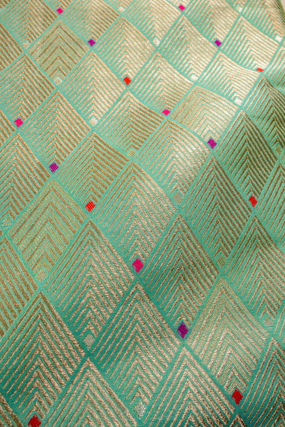 Handwoven shot green silk brocade fabric