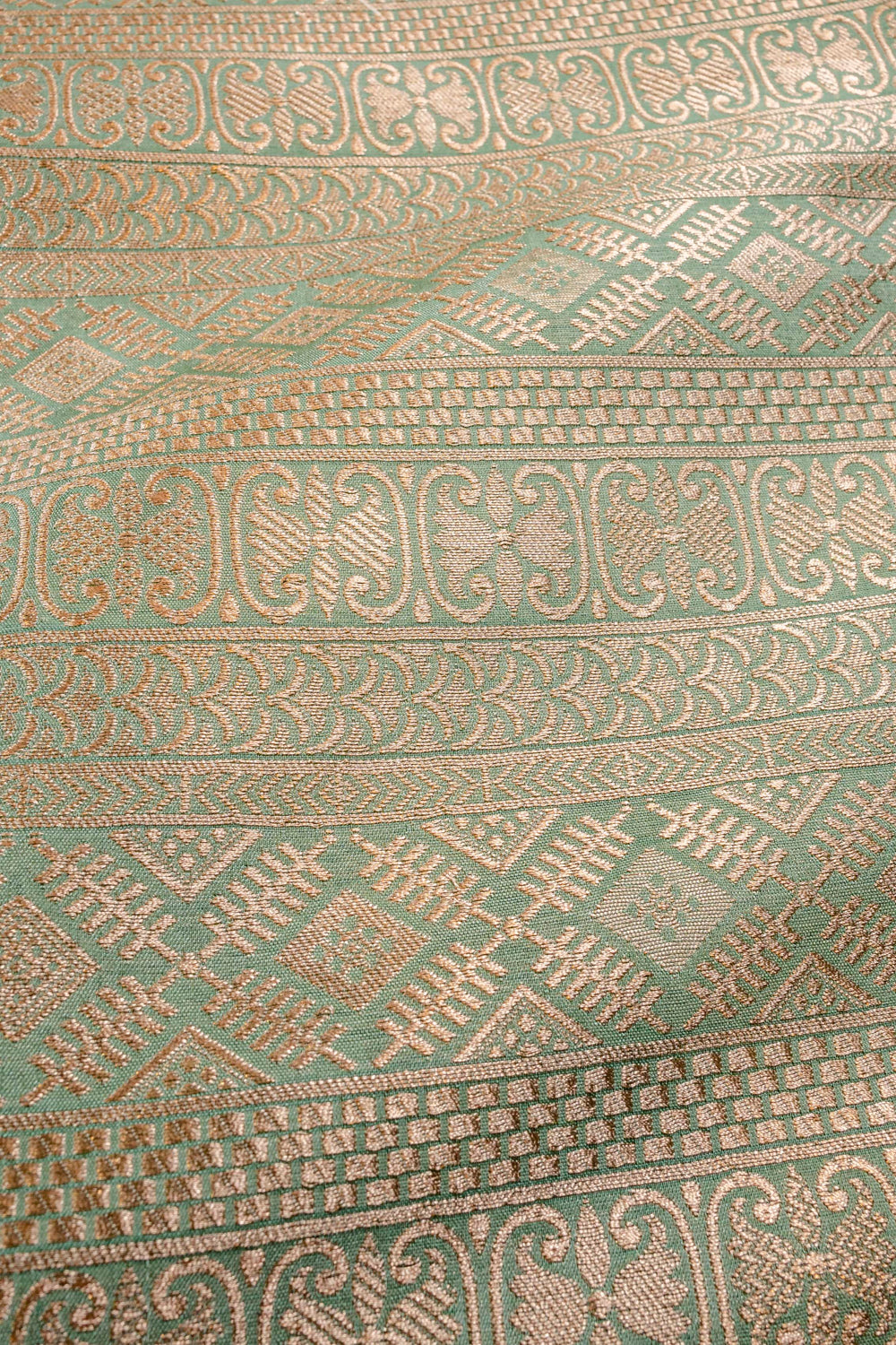 Handwoven sage green silk brocade fabric