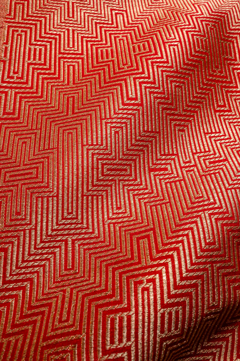 Handwoven red silk brocade fabric