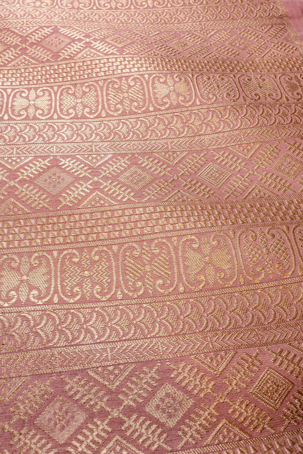 Handwoven pastel pink silk brocade fabric