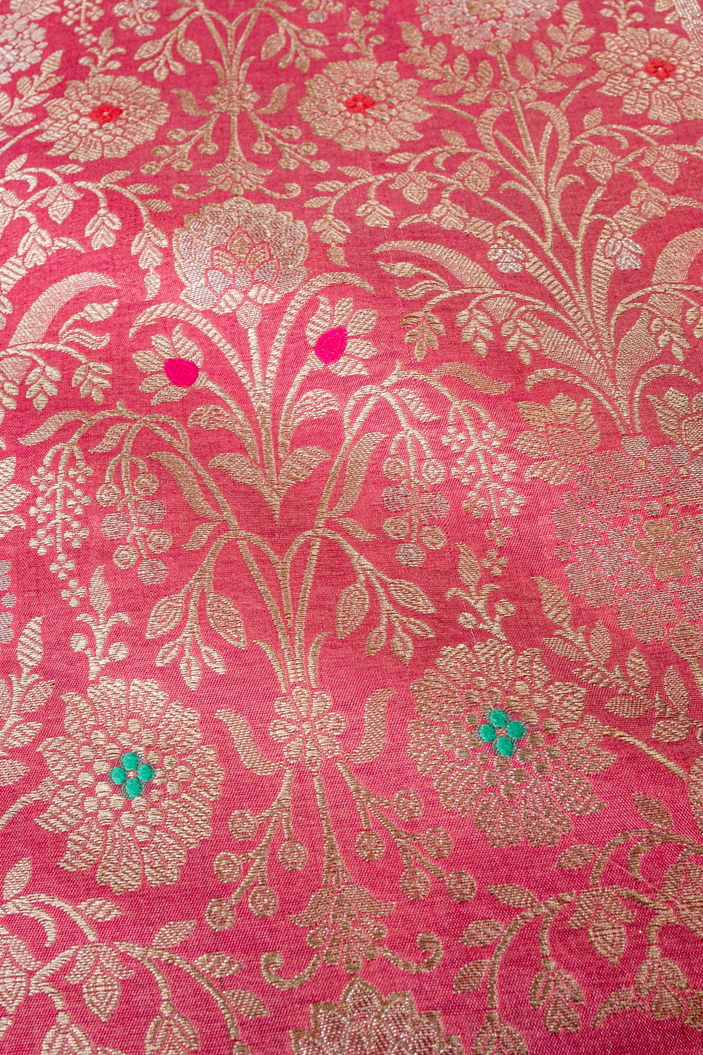 Handwoven carrot pink silk brocade fabric