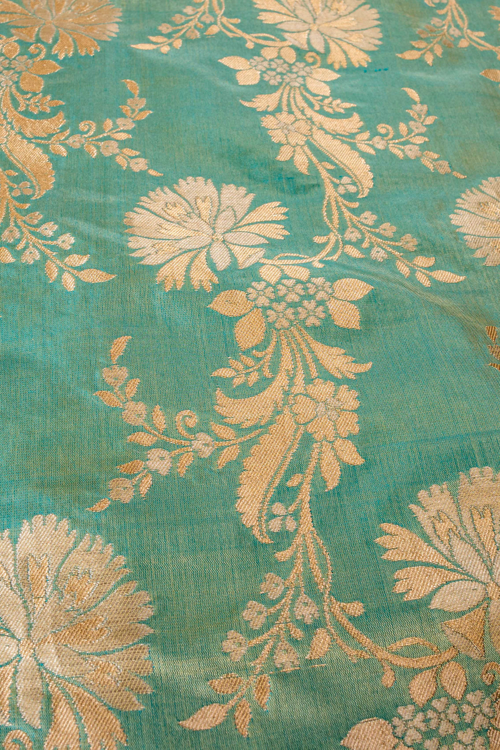 Handwoven shot green silk jangla fabric