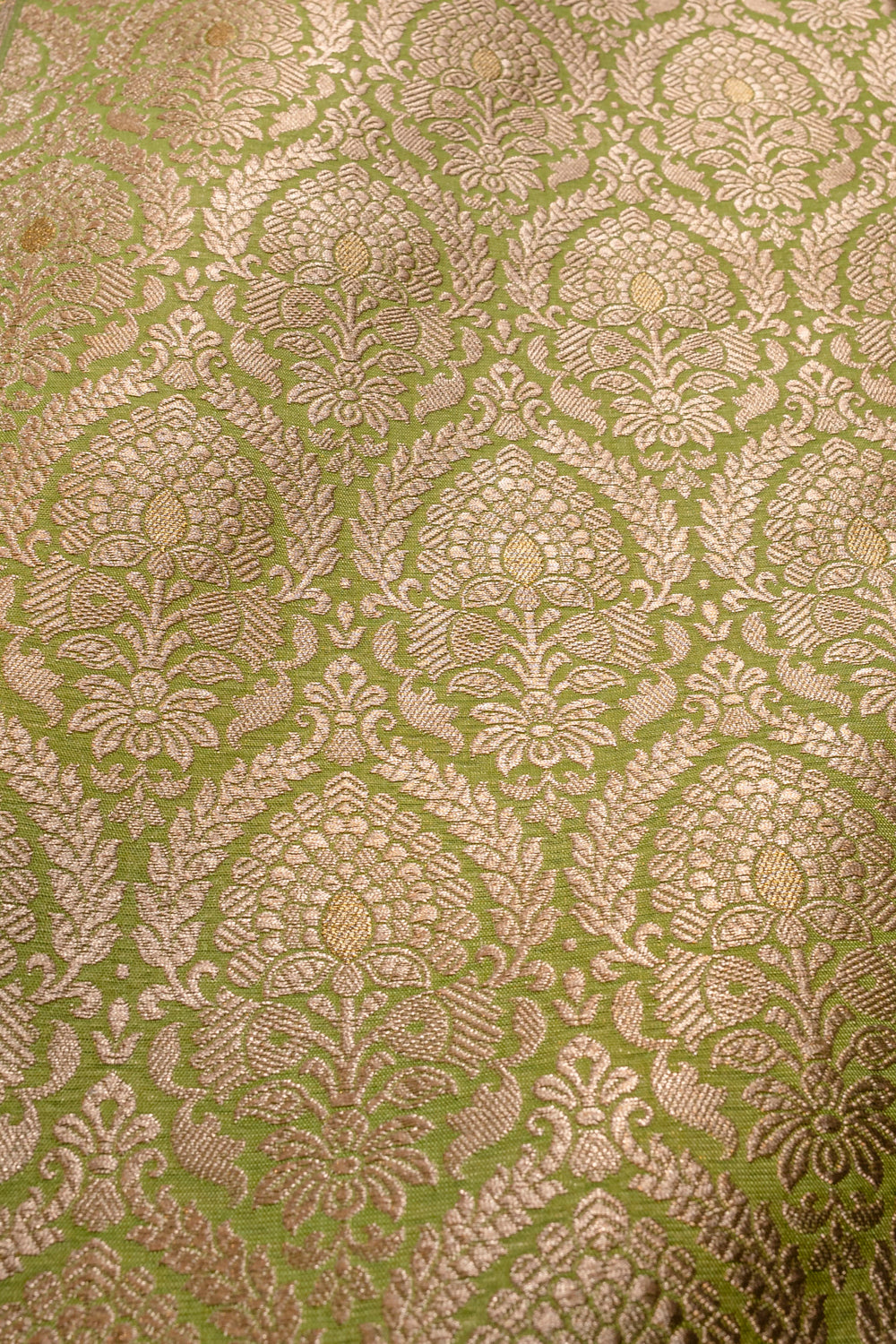 Handwoven leaf green silk brocade fabric