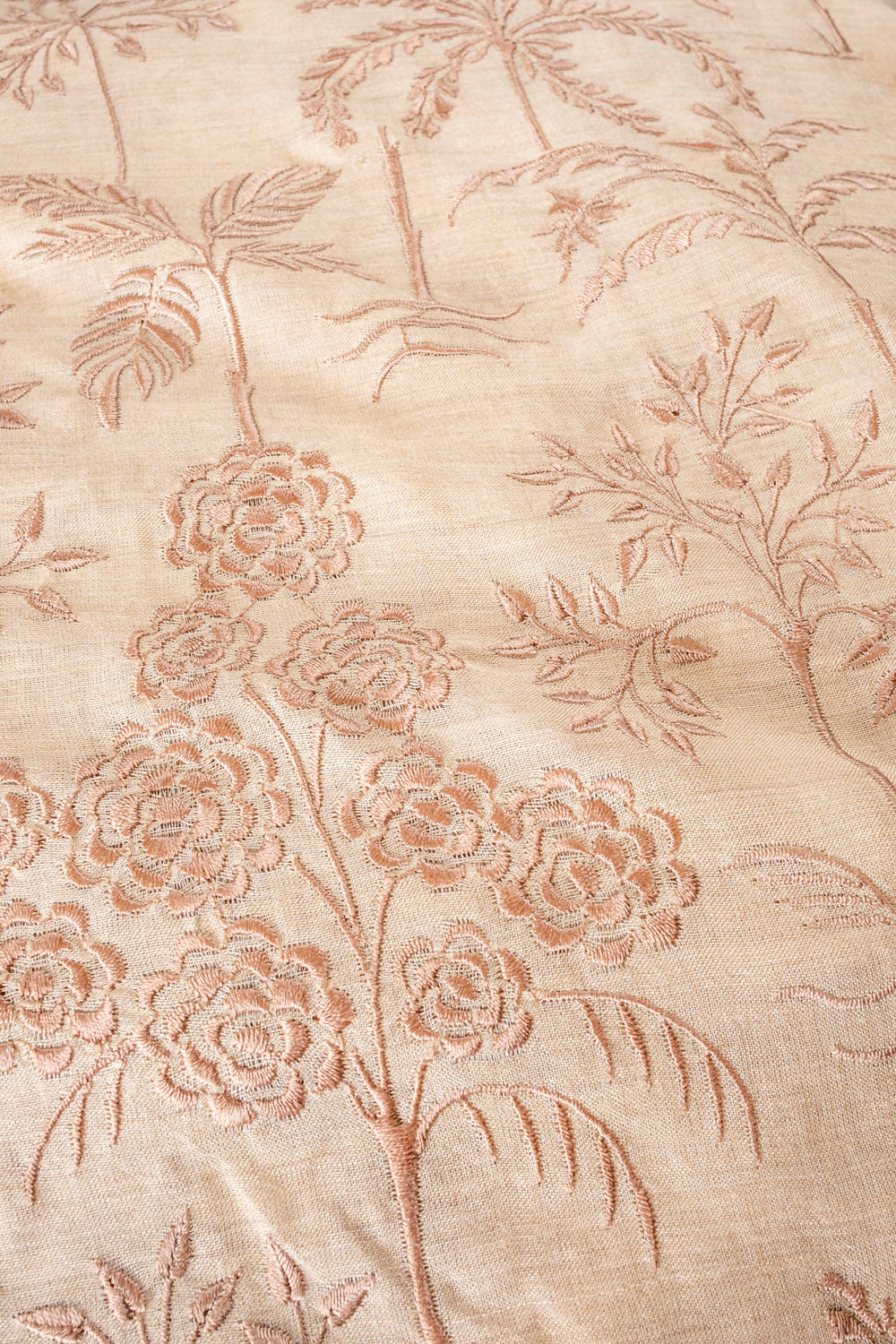 Handwoven beige embroidered muga silk fabric