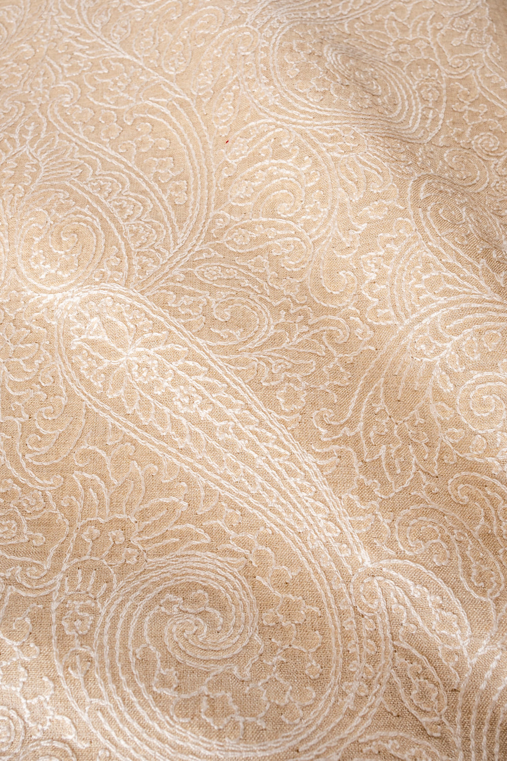 Handwoven cream embroidered muga silk fabric