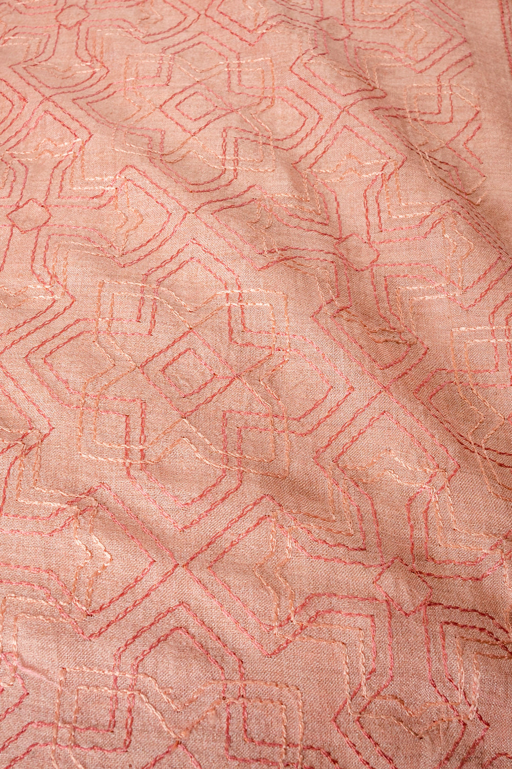 Handwoven pink embroidered muga silk fabric