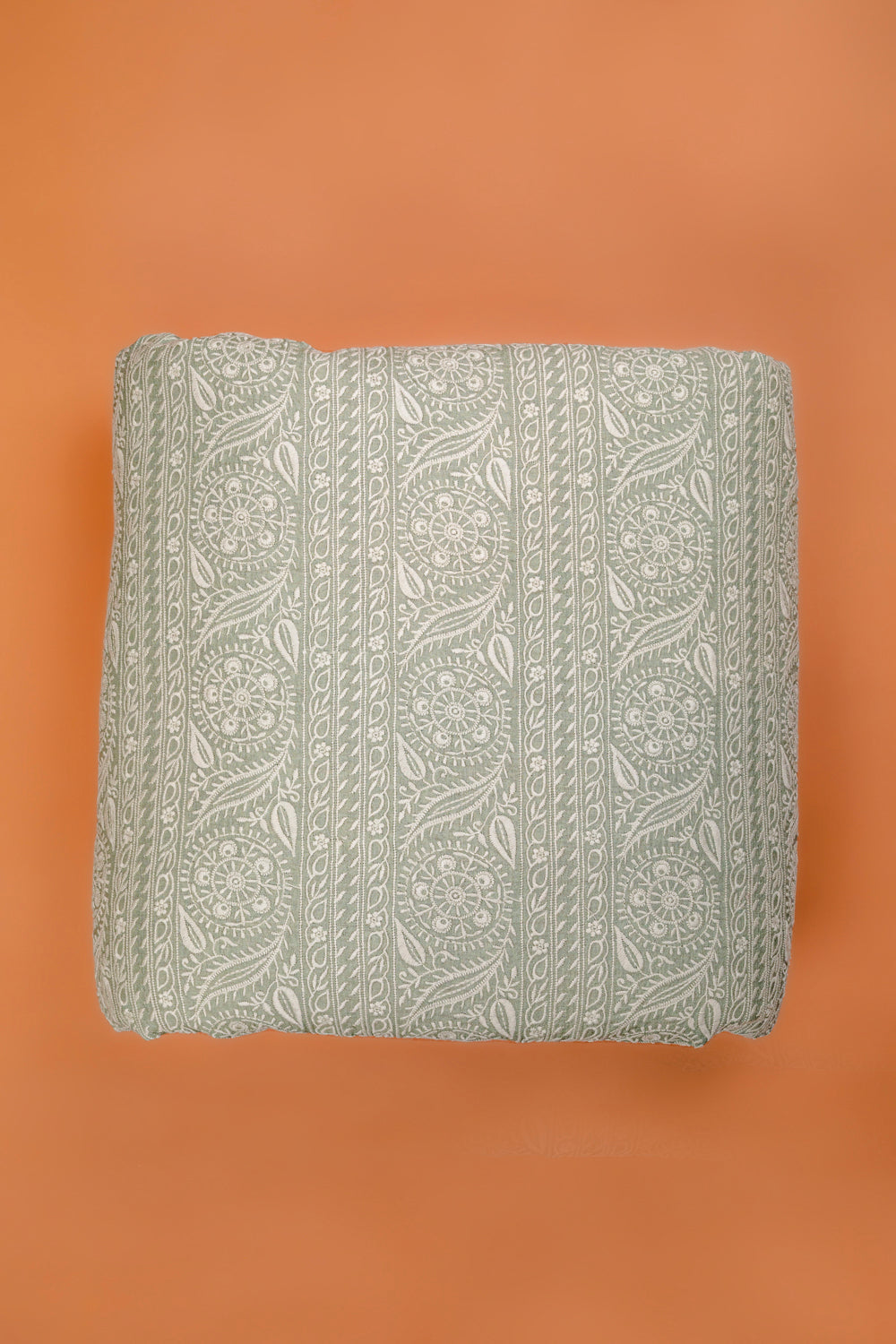 Handwoven sage green embroidered muga silk fabric