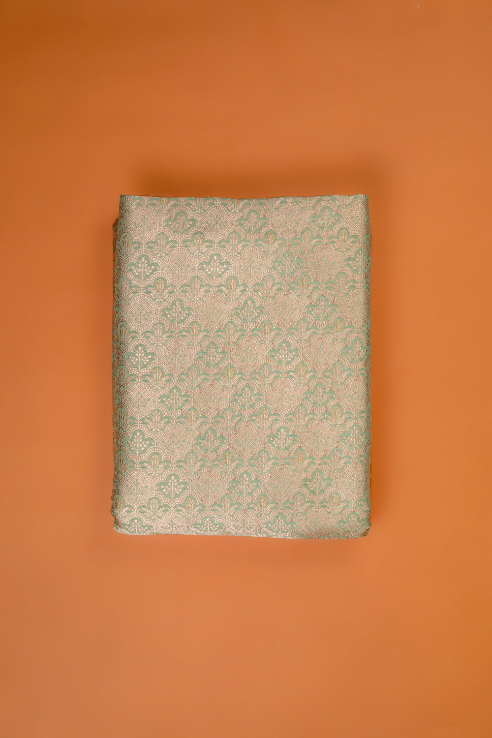 Handwoven sage green silk brocade fabric