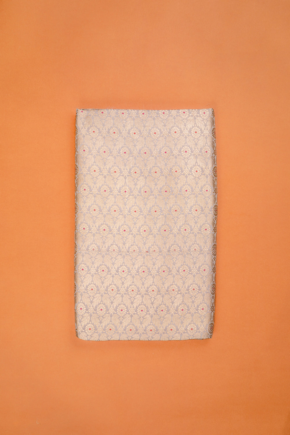 Handwoven pale grey silk brocade fabric