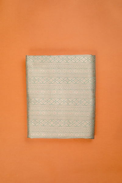 Handwoven sage green silk brocade fabric