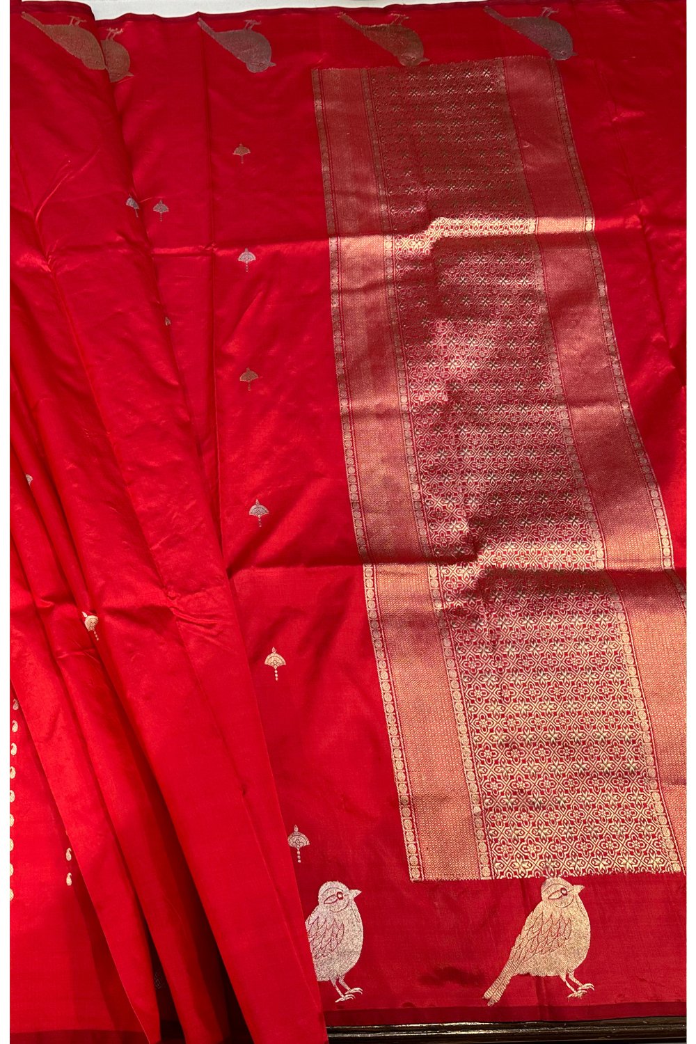 Handwoven red animal motif pure silk saree