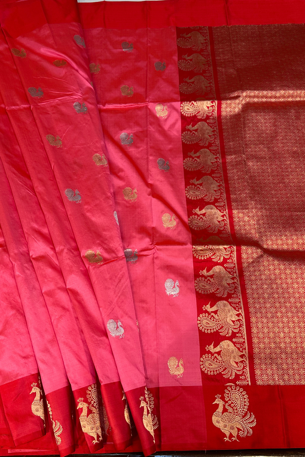 Handwoven bubblegum pink animal motif saree