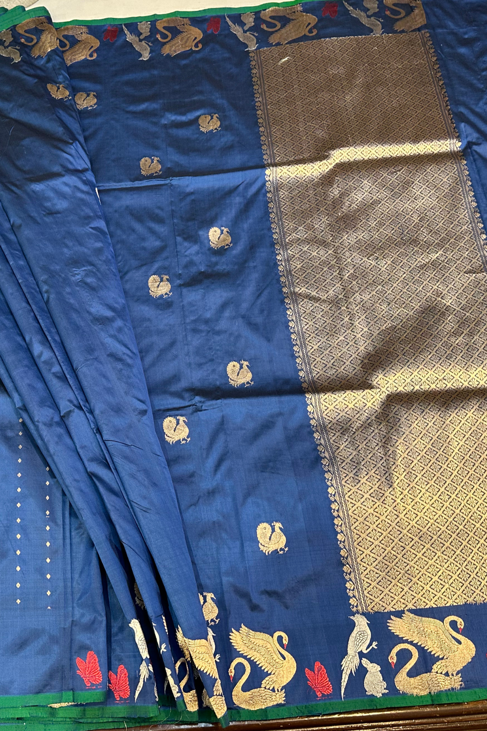 Handwoven blue animal motif pure silk saree