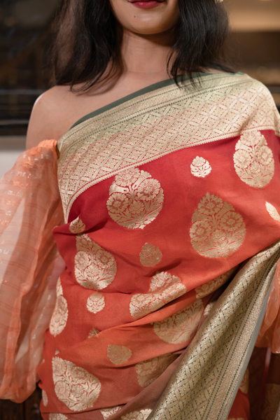 Handwoven orange-green georgette saree