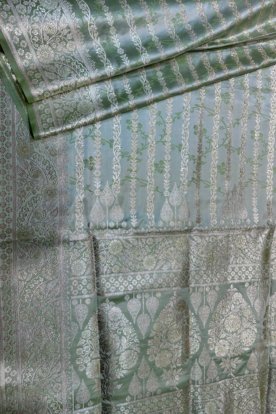 Woven green tanchoi satin saree