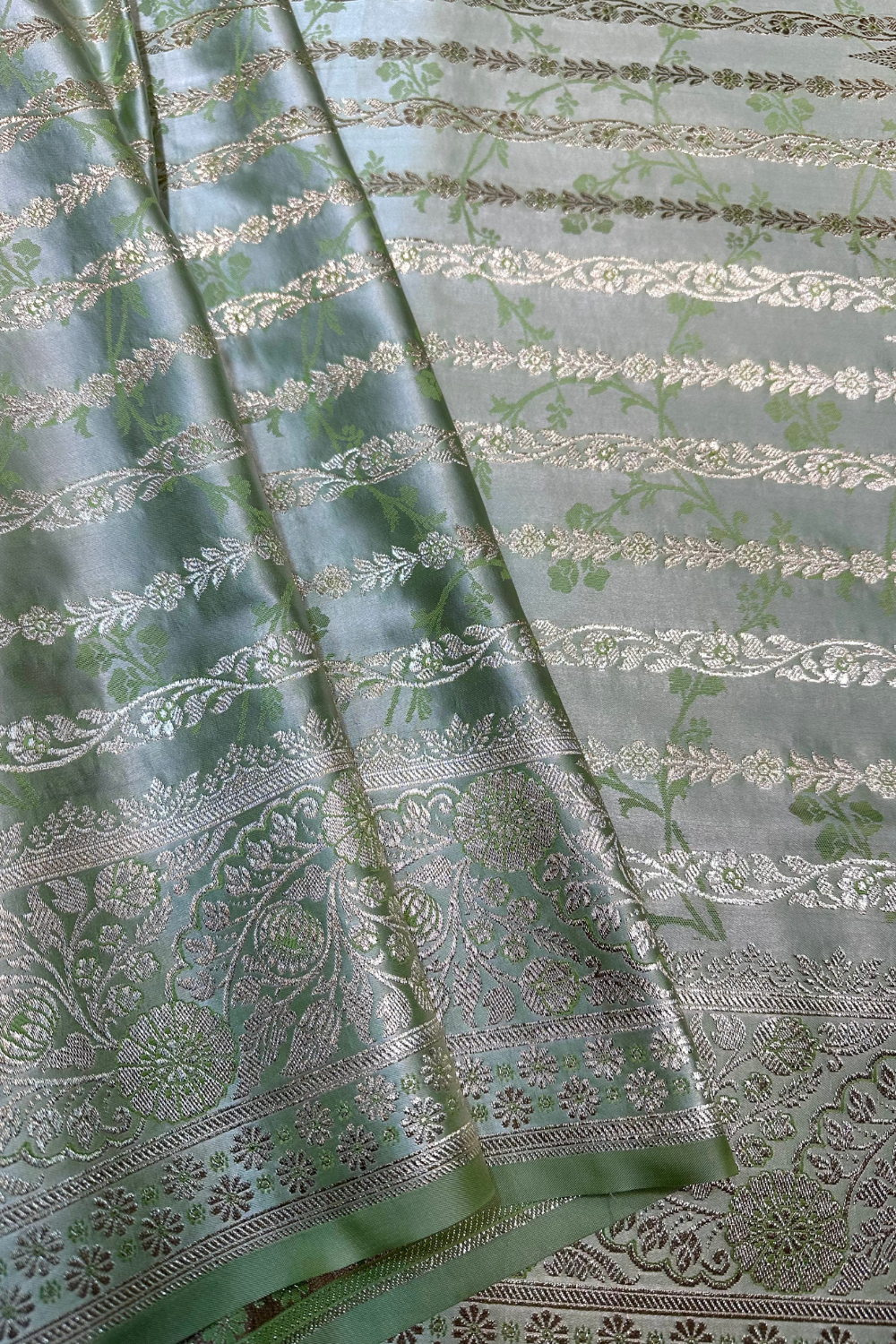 Woven green tanchoi satin saree