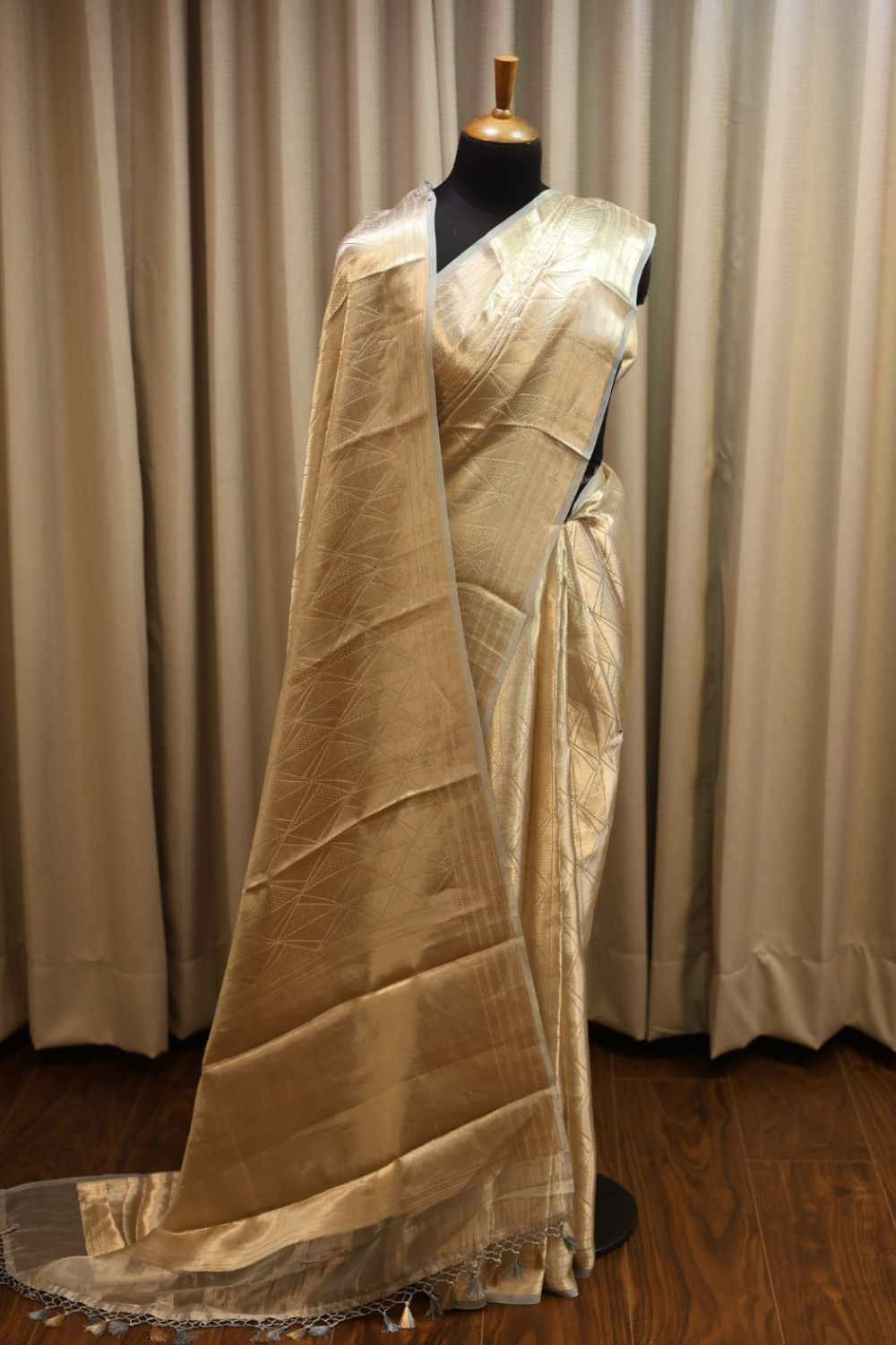 Handwoven molten champagne gold-frost blue pure tissue brocade saree