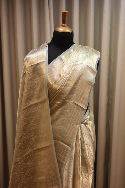 Handwoven molten champagne gold-frost blue pure tissue brocade saree