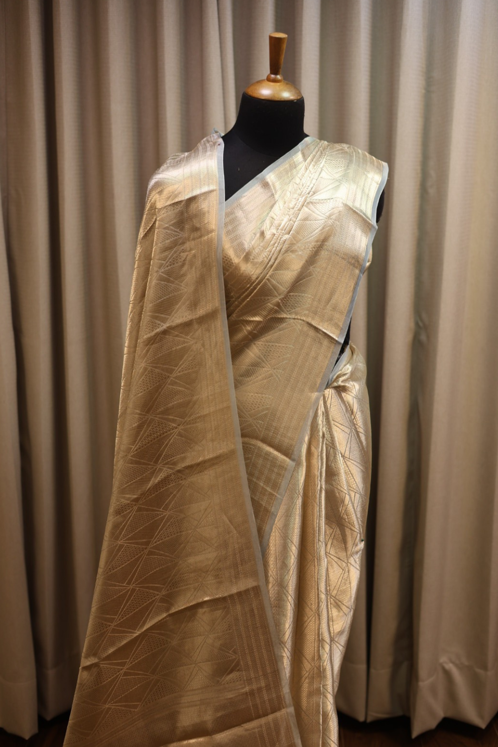 Handwoven molten champagne gold-frost blue pure tissue brocade saree