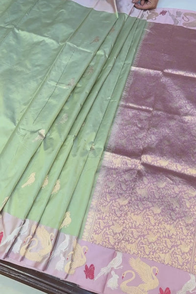 Handwoven green animal motif pure silk saree