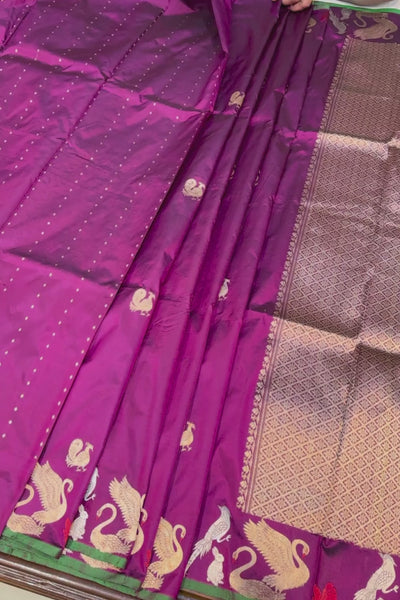 Handwoven wine animal motif pure silk saree