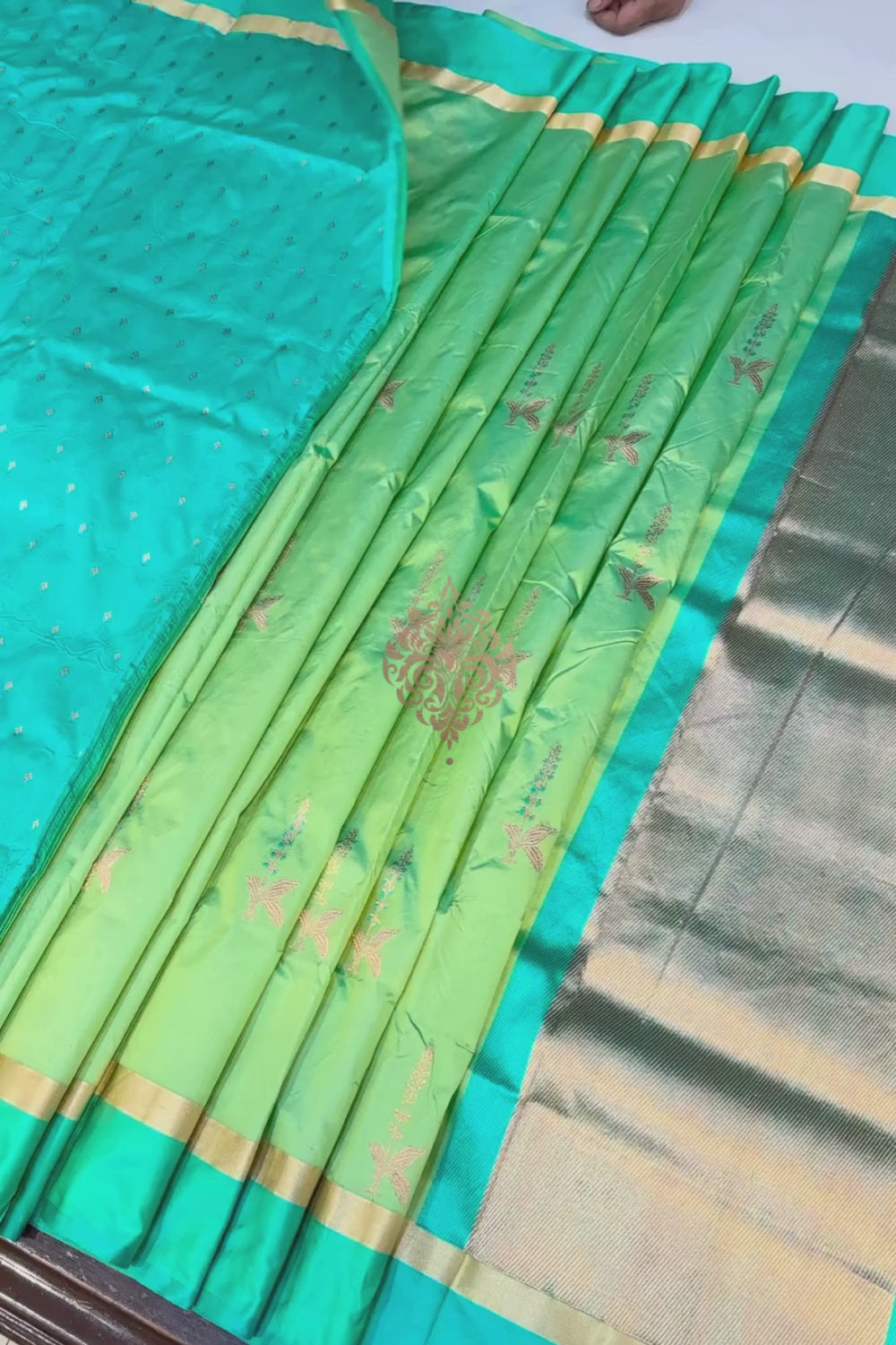 Handwoven shot green pure silk saree