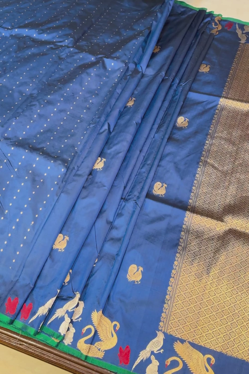 Handwoven blue animal motif pure silk saree