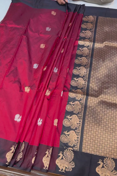 Handwoven deep red animal motif pure silk saree